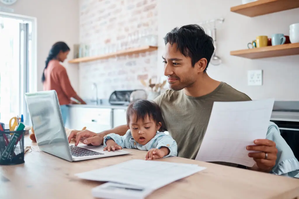 What a living trust can accomplish? A father working on an estate plan with his family